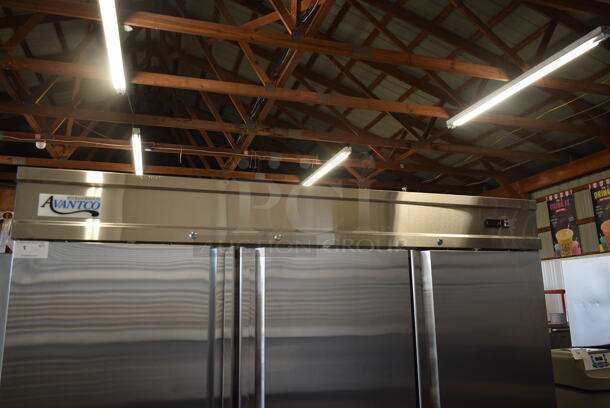 BRAND NEW SCRATCH AND DENT! 2023 Avantco 178SS3FHC Stainless Steel Commercial 3 Door Reach In Freezer w/ Poly Coated Racks and Commercial Casters. 115 Volts, 1 Phase. Stock Picture Used as Gallery. Tested and Working! - Image 3 of 12