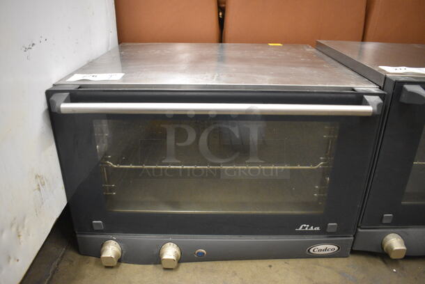 2012 Cadco Unox XAF013 Lisa Metal Commercial Countertop Electric Powered Convection Oven. 120 Volts, 1 Phase. 23.5x25x15. Tested and Working!