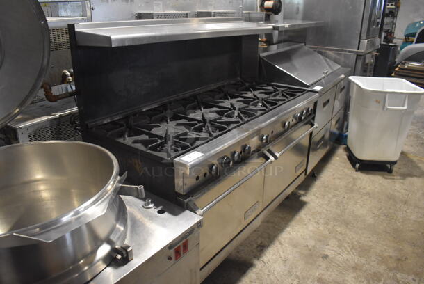 Imperial Commercial Stainless Steel Natural Gas Range With 10  Burners and 2 Ovens With Metal Racks On Commercial Casters.  - Image 2 of 7