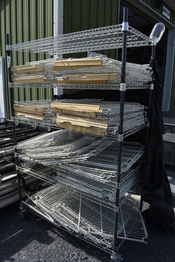 ALL ONE MONEY! Metro Chrome and Black Finish 6 Tier Shelving Unit on Commercial Casters w/ Lot of Poly Coated Racks. BUYER MUST DISMANTLE. PCI CANNOT DISMANTLE FOR SHIPPING. PLEASE CONSIDER FREIGHT CHARGES. 48x24x78 - Image 4 of 5