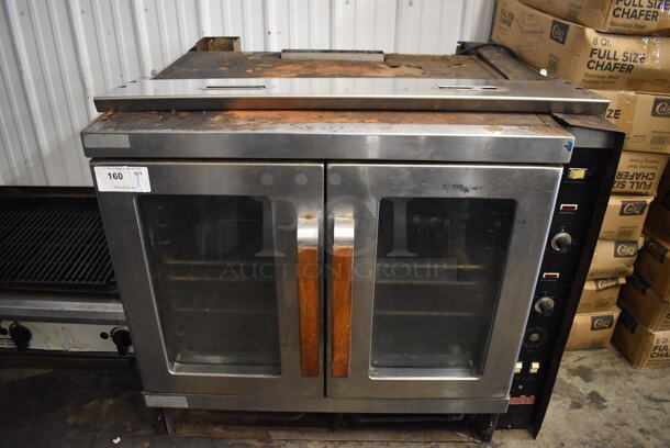 Vulcan Snorkel Stainless Steel Commercial Natural Gas Powered Full Size Convection Oven w/ View Through Doors, Metal Oven Racks and Thermostatic Controls. 40x40x35