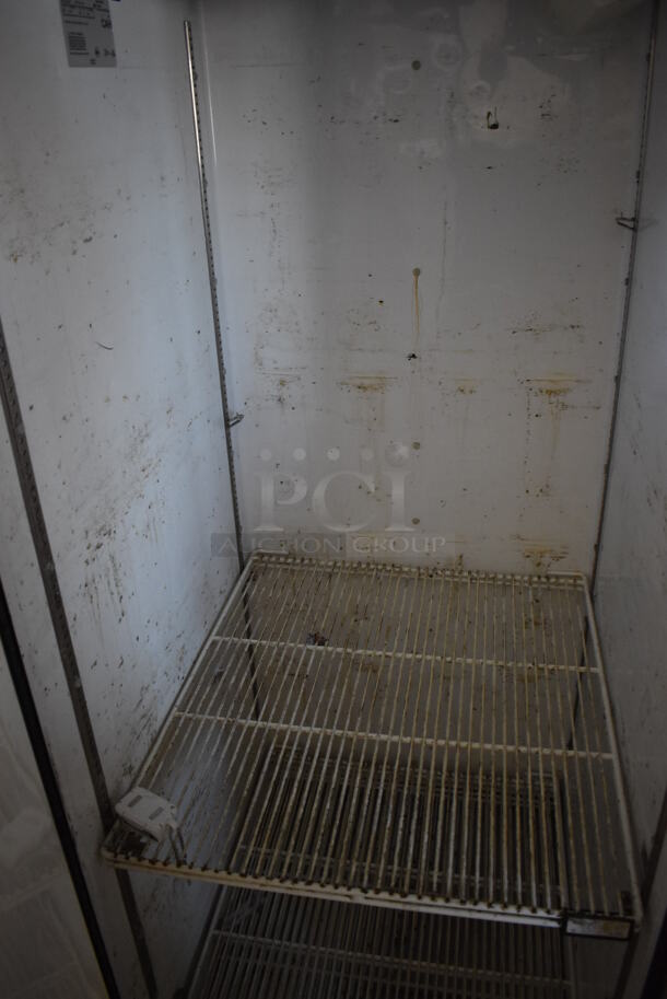 True TG1R-1S Stainless Steel Commercial Single Door Reach In Cooler w/ Poly Coated Racks on Commercial Casters. 115 Volts, 1 Phase. 29x35x83. Tested and Working! - Image 4 of 4