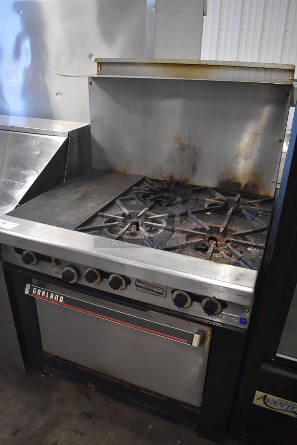 Garland Stainless Steel Commercial Natural Gas Powered 4 Burner Range w/ Left Side Flat Top Griddle, Oven, Over Shelf and Back Splash. 36x30x60 - Image 5 of 6