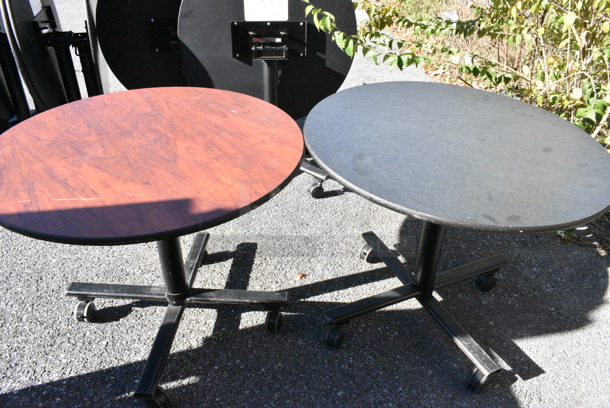 32 Various Patterned Folding Round Table on Casters. 32 Times Your Bid!  - Image 1 of 8