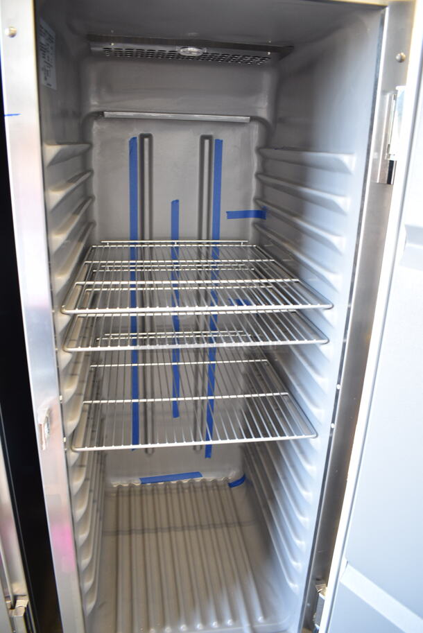 BRAND NEW SCRATCH AND DENT! 2023 Delfield 6025XL-S Stainless Steel Commercial Single Door Reach In Cooler w/ Racks on Commercial Casters. 115 Volts, 1 Phase. Tested and Working! - Image 5 of 6
