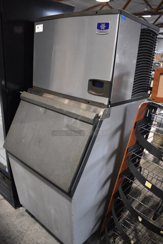 2017 Manitowoc IY0505W-161 Stainless Steel Commercial Ice Head on Commercial Bin. Comes w/ 3 Blue Poly Ice Buckets. 115 Volts, 1 Phase. 