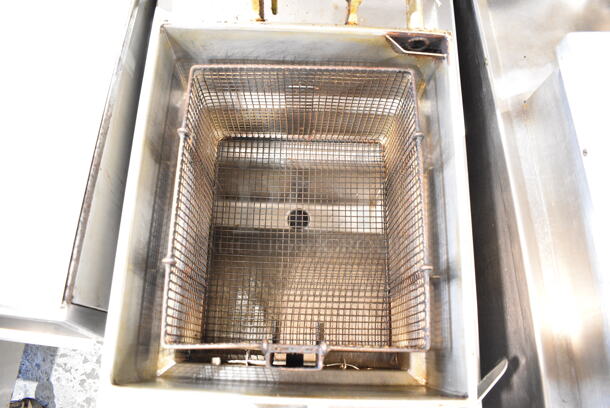 Henny Penny 600 Stainless Steel Commercial Floor Style Natural Gas Powered Pressure Fryer w/ Metal Fry Basket on Commercial Casters. 80,000 BTU.  - Image 6 of 10
