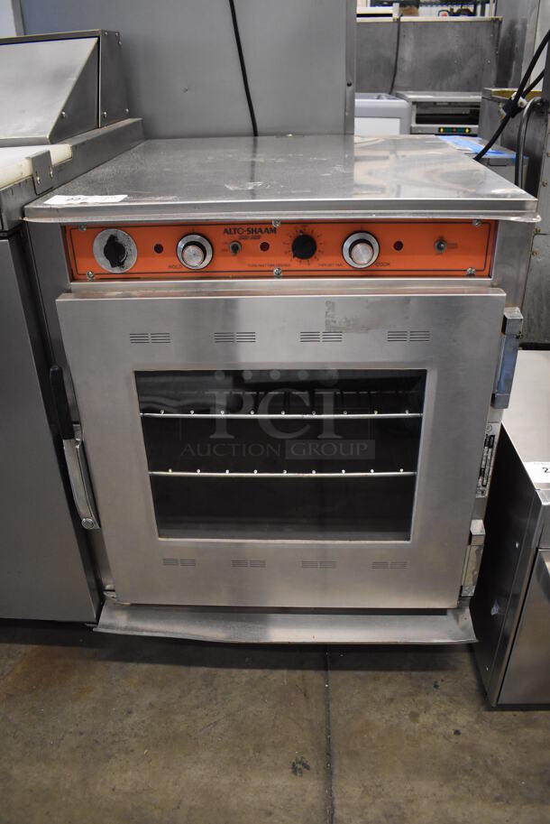 Alto Shaam CH-75DM Stainless Steel Commercial Cook N Hold Cabinet on Commercial Casters. 120/208-240 Volts, 1 Phase. 25.5x32x33