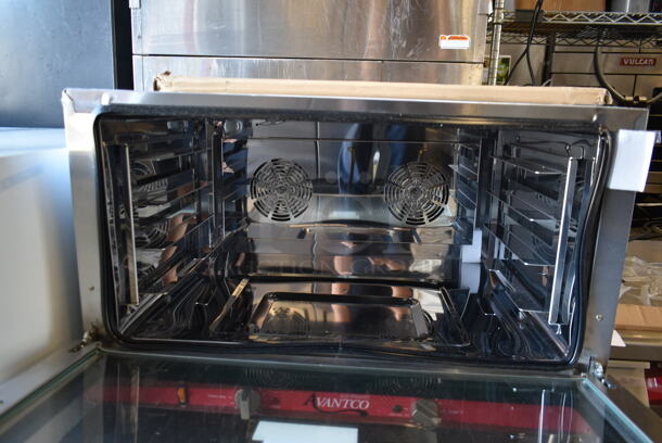 BRAND NEW SCRATCH AND DENT! Avantco 177CO38M Stainless Steel Commercial Countertop Electric Powered Full Size Convection Oven. 208/240 Volts, 1 Phase.  - Image 4 of 5