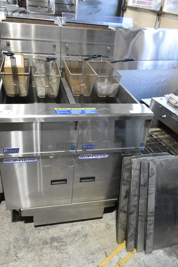BRAND NEW SCRATCH AND DENT! Pitco Frialator SSH55 Stainless Steel Commercial Natural Gas Powered 2 Bay Deep Fat Fryer w/ 4 Metal Fry Baskets and 4 Splash Guards on Commercial Casters. 80,000 BTU.  - Image 2 of 12