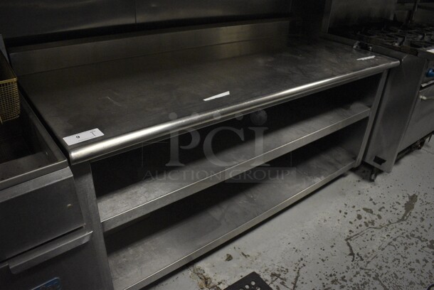 Stainless Steel Commercial Table w/ Back Splash and 2 Under Shelves. 72x30x39. (kitchen)