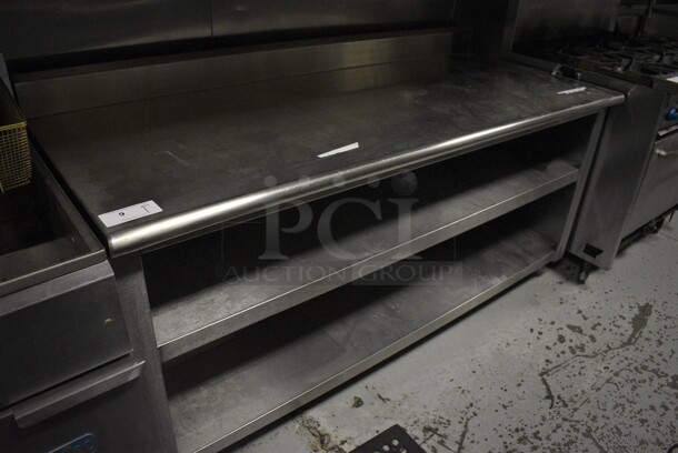 Stainless Steel Commercial Table w/ Back Splash and 2 Under Shelves. 72x30x39. (kitchen) - Image 1 of 4