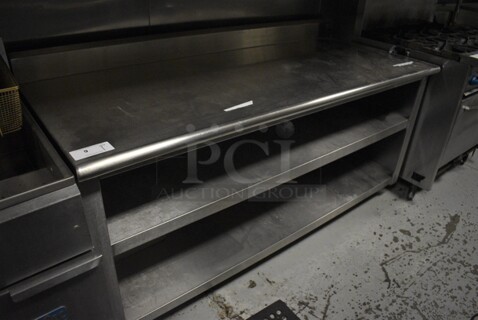Stainless Steel Commercial Table w/ Back Splash and 2 Under Shelves. 72x30x39. (kitchen)