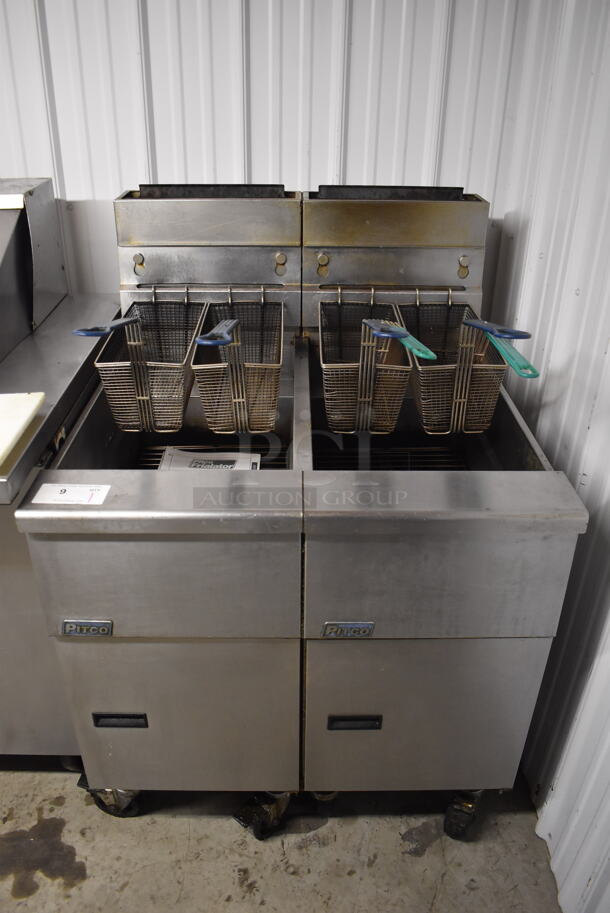 2012 Pitco Frialator SG14 Stainless Steel Commercial 2 Bay Natural Gas Powered Deep Fat Fryer w/ 4 Metal Fry Baskets on Commercial Casters. 110,000 BTU. 31.5x34x48 - Image 1 of 11