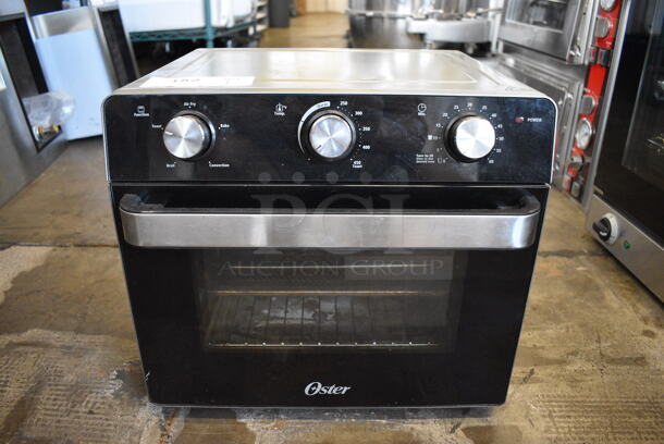 Oster Model TSSTTVMAF1 Stainless Steel Countertop Electric Powered Air Fryer Oven. 120 Volts, 1 Phase. 16x17x15