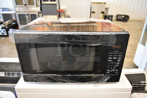 BRAND NEW SCRATCH AND DENT! JES2051ON4 Metal Countertop Microwave Oven. - Image 1 of 6