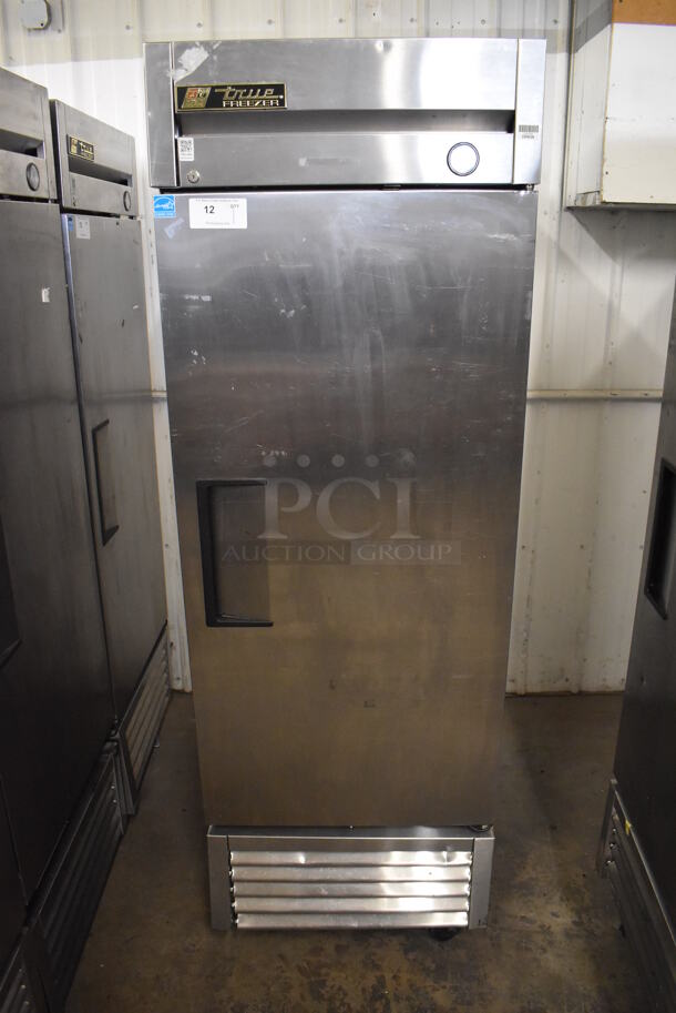 2013 True T-23F ENERGY STAR Stainless Steel Commercial Single Door Reach In Freezer w/ Poly Coated Racks on Commercial Casters. 115 Volts, 1 Phase. 27x30x83.5. Tested and Working!