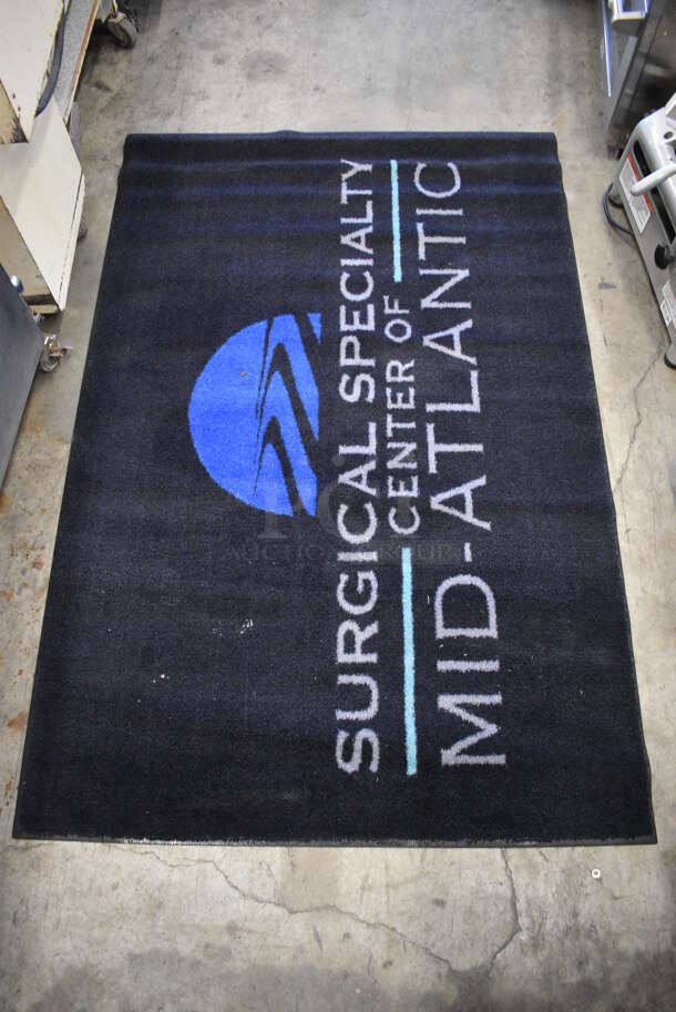 Black Floor Rug w/ Surgical Specialty Center of Mid-Atlantic Logo. 67x44