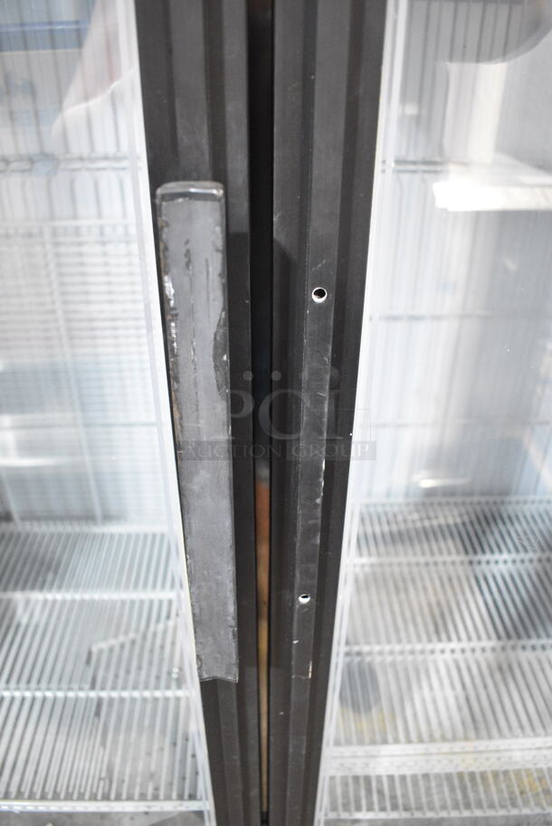 True GDM-49F Metal Commercial 2 Door Reach In Freezer Merchandiser w/ Poly Coated Racks. 115/208-230 Volts, 1 Phase.  - Image 3 of 6
