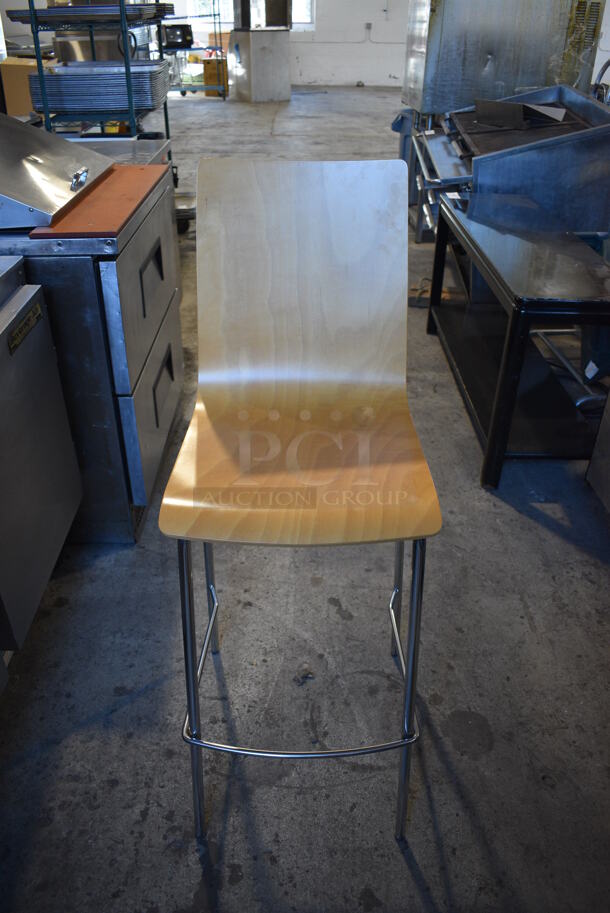 4 Wood Pattern Bar Height Chairs on Chrome Finish Metal Legs. Stock Picture - Cosmetic Condition May Vary. 16x19x45. 4 Times Your Bid!