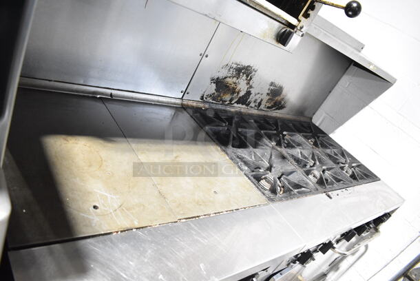 Southbend Stainless Steel Commercial Natural Gas Powered 6 Burner Range w/ Flat Top Griddle, 2 Ovens, Cheese Melter and Back Splash on Commercial Casters.  - Image 4 of 9