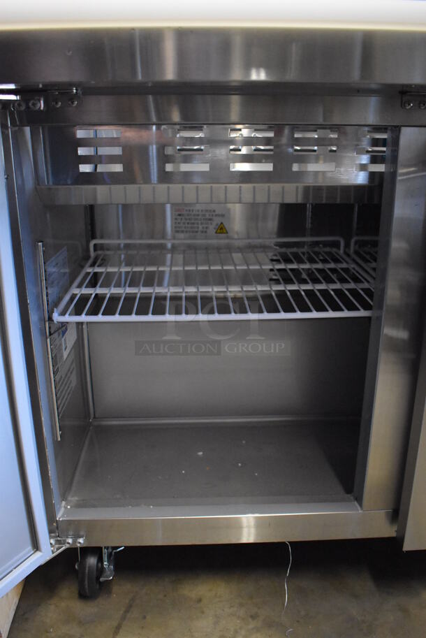 BRAND NEW SCRATCH AND DENT! Avantco 178SSPT71MHC Stainless Steel Commercial Sandwich Salad Prep Table Bain Marie Mega Top on Commercial Casters. 115 Volts, 1 Phase. Tested and Working! - Image 5 of 10