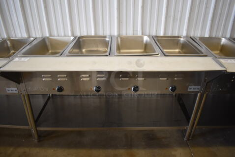 ServIt 423EST4WE750 Stainless Steel Commercial Electric Powered 4 Bay Electric Powered Steam Table w/ Cutting Board and Under Shelf. 208/240 Volts. 58x30x34