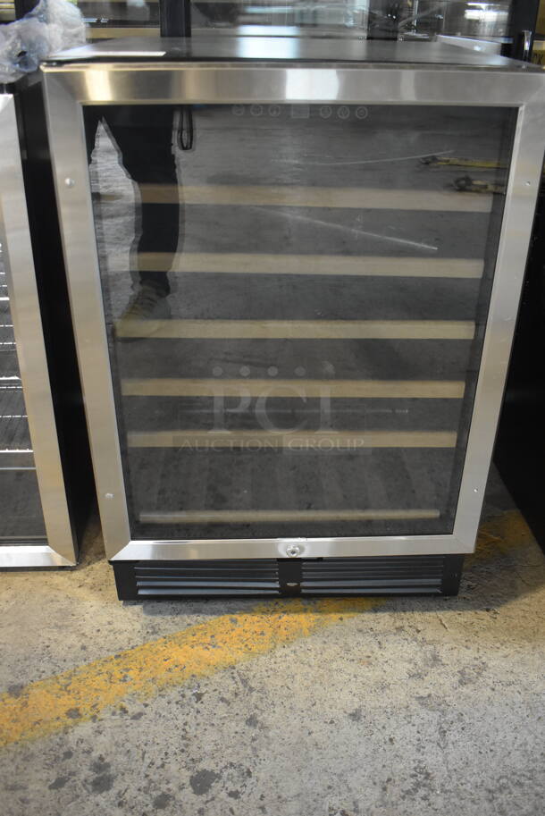 BRAND NEW SCRATCH AND DENT! Avanti WCR506SS Stainless Steel Free Standing Glass Door With Stainless Steel Trim Electric Powered Wine Chiller. 115V Tested and Working!