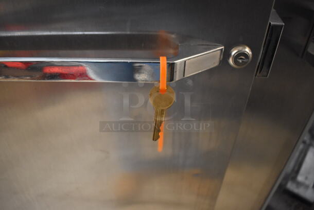 Continental 2FE Stainless Steel Commercial 2 Door Reach In Freezer on Commercial Casters. 115 Volts, 1 Phase. 54x36x82. Tested and Powers On But Temps at 24 Degrees - Image 6 of 7