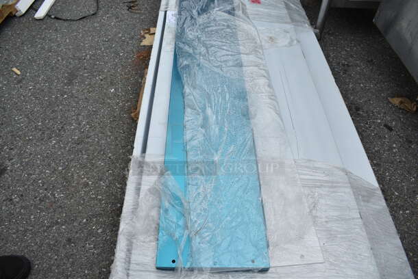 BRAND NEW SCRATCH AND DENT! Regency 600TSB3072S 30" x 72" 16-Gauge Stainless Steel Commercial Work Table with 4" Backsplash and Undershelf - Image 4 of 5