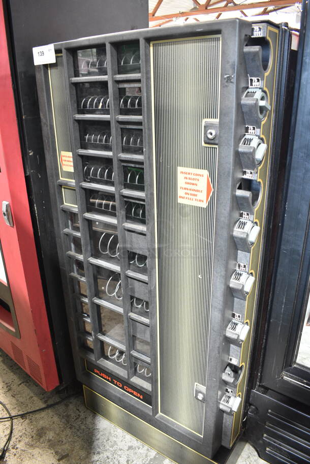 WCI FMR10 Metal Commercial Vending Machine. No Key, Lock Drilled Out. 115 Volts, 1 Phase. Tested and Powers On But Does Not Get Cold - Image 1 of 7