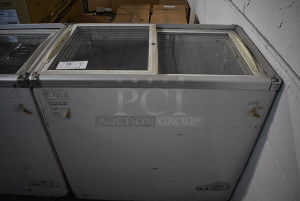 Intertek Model SD/SC-208JY Chest Cooler Merchandiser w/ 2 Sliding Lids on Commercial Casters. 110 Volts, 1 Phase. 33x20x33. Tested and Working!