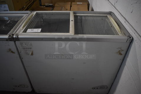 Intertek Model SD/SC-208JY Chest Cooler Merchandiser w/ 2 Sliding Lids on Commercial Casters. 110 Volts, 1 Phase. 33x20x33. Tested and Working!