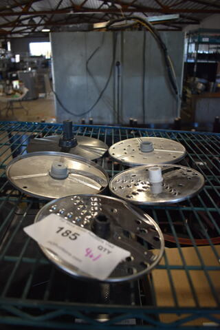 4 Various Metal Food Processor Blades; 3 Grating and 1 Slicing. Comes w/ Black Poly Blade Cover. 6x6x1, 7x7x1. 4 Times Your Bid!