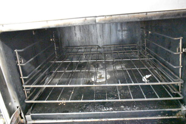 Southbend Platinum P36D-GRAD Stainless Steel Commercial Natural Gas Powered Single Burner Range w/ Salamander Cheese Melter and Oven on Commercial Casters.  - Image 8 of 11