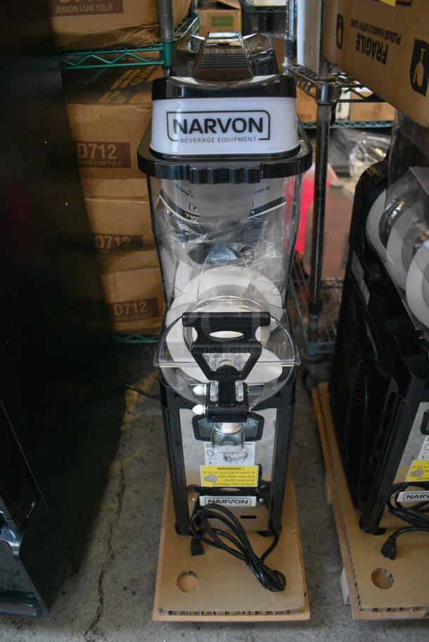 BRAND NEW IN BOX! Narvon Model OASIS 1-10 Metal Commercial Countertop Single Hopper Slushie Machine. Hopper Has 2.6 Gallon Capacity. 120 Volts, 1 Phase. 8x21x30. Tested and Working!