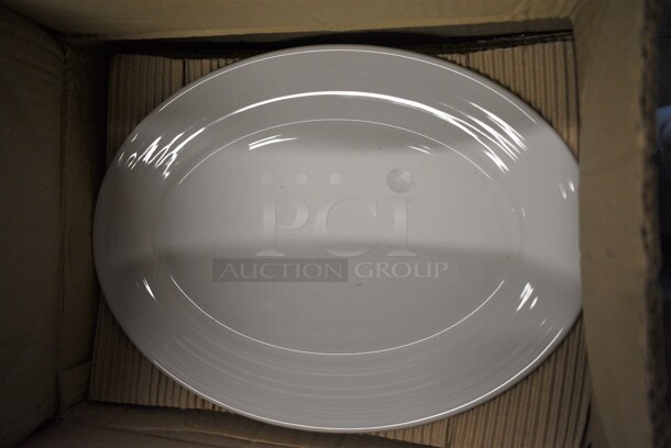 24 BRAND NEW IN BOX! Sant Andrea White Ceramic Oval Plates. 14.5x10.5x1. 24 Times Your Bid!