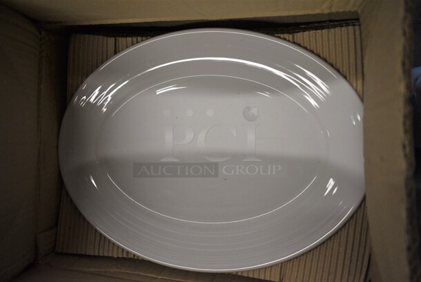 36 BRAND NEW IN BOX! Sant Andrea White Ceramic Oval Plates. 14.5x10.5x1. 36 Times Your Bid!