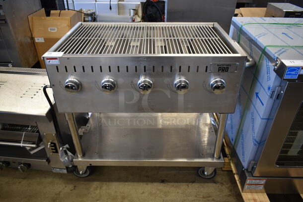 BRAND NEW SCRATCH AND DENT! 2022 Backyard Pro 554LPG36 Stainless Steel Commercial Floor Style Propane Gas Powered Outdoor Grill w/ Under Shelf on Commercial Casters. Tested and Working!