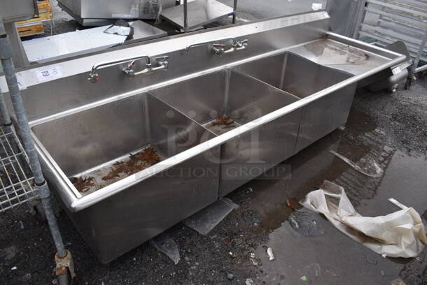 Stainless Steel Commercial 3 Bay Sink w/ 2 Faucets, 2 Handle Sets and Right Side Drain Board. No Legs. 99x30x25. Bays 24x24x13. Drain Board 22x26x1 - Image 1 of 4