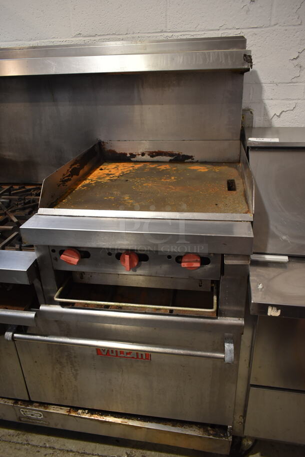 Vulcan VG260 Stainless Steel Commercial Natural Gas Powered 6 Burner Range w/ Right Side Flat Top Griddle, 2 Ovens, Over Shelf and Back Splash on Commercial Casters.   - Image 3 of 11