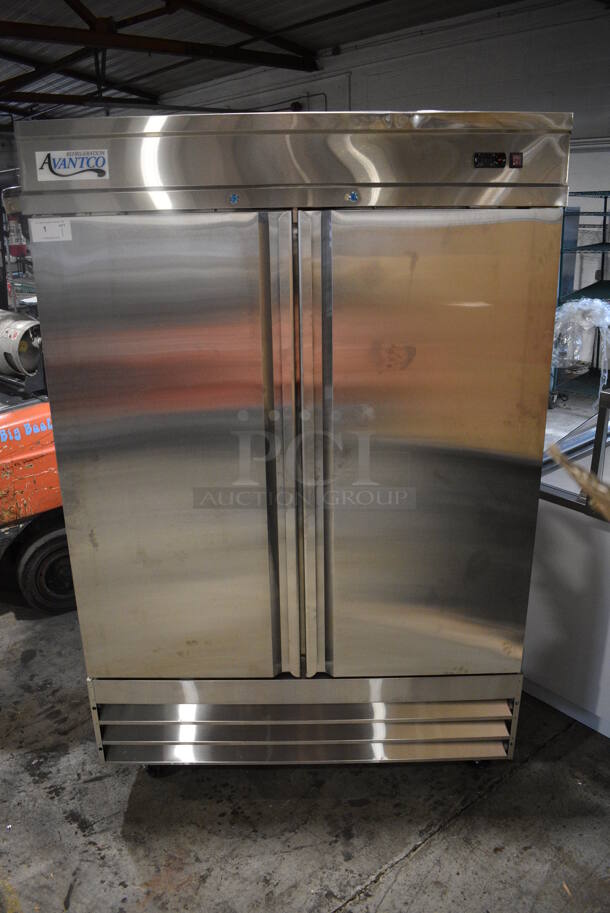 BRAND NEW SCRATCH AND DENT! Avantco 178SS2RHC Stainless Steel Commercial 2 Door Reach In Cooler on Commercial Casters. 115 Volts, 1 Phase. 54x33x82. Tested and Working!