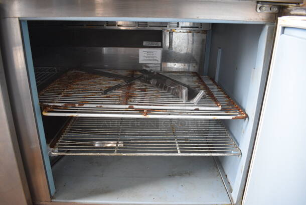 2013 Delfield Model 4460N-24M-A880 Stainless Steel Commercial Sandwich Salad Prep Table Bain Marie on Commercial Casters. 115 Volts, 1 Phase. 60.5x32x36. Tested and Working! - Image 7 of 7