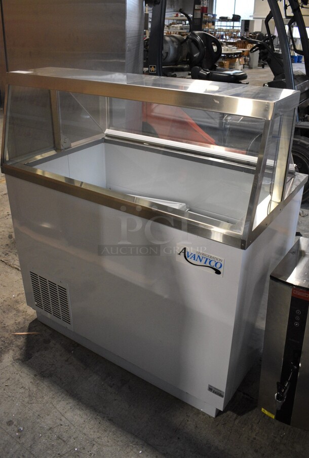 BRAND NEW SCRATCH AND DENT! Avantco 178CPW47HC Stainless Steel Commercial Ice Cream Dipping Cabinet Freezer w/ 8 White Poly Ice Cream Tub Collars. 115 Volts, 1 Phase. 47x28x52. Tested and Working!