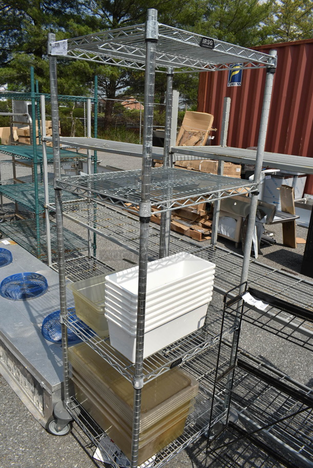Chrome Finish 4 Tier Wire Shelving Unit on Commercial Casters w/ Contents Including White Poly Bins. BUYER MUST DISMANTLE. PCI CANNOT DISMANTLE FOR SHIPPING. PLEASE CONSIDER FREIGHT CHARGES. - Image 1 of 6