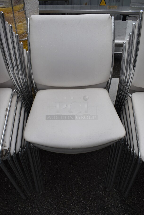 14 White Dining Chairs on Chrome Finish Metal Frames. Stock Picture - Cosmetic Condition May Vary. 20x23x35. 14 Times Your Bid!