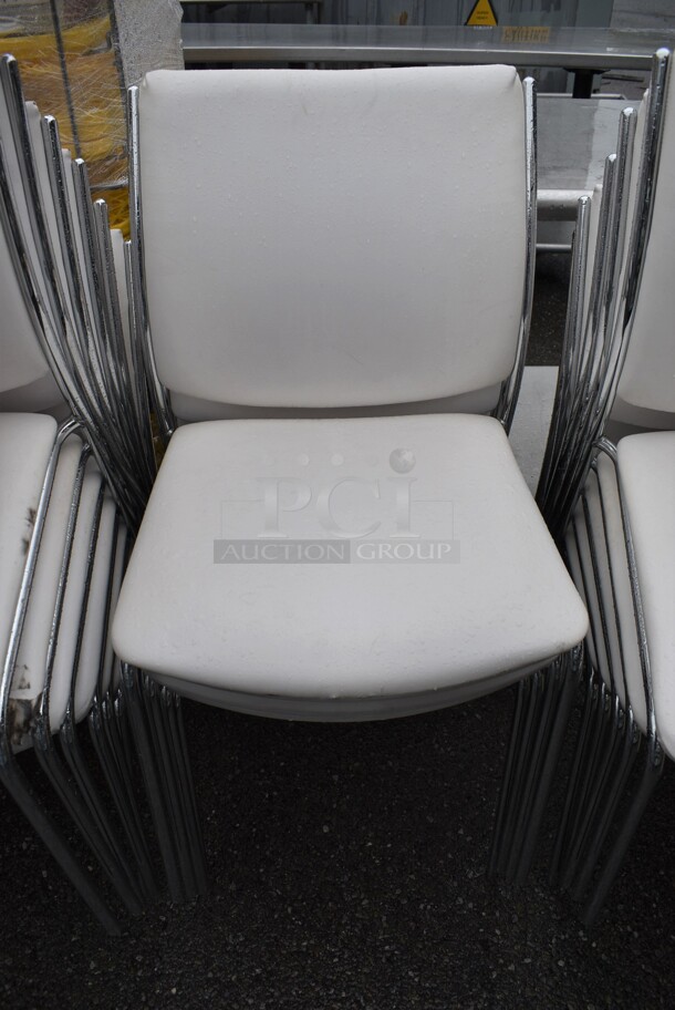 16 White Dining Chairs on Chrome Finish Metal Frames. Stock Picture - Cosmetic Condition May Vary. 20x23x35. 16 Times Your Bid! - Image 1 of 4