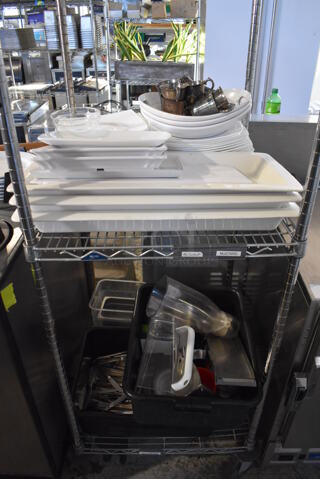 ALL ONE MONEY! Lot of 2 Tiers Worth of Various Items Including Poly Plates, Silverware and Bus Bins. Does Not Include Shelving Unit