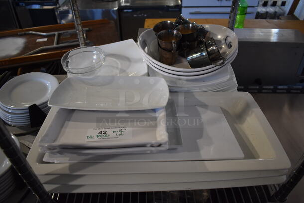 ALL ONE MONEY! Lot of 2 Tiers Worth of Various Items Including Poly Plates, Silverware and Bus Bins. Does Not Include Shelving Unit - Image 2 of 5