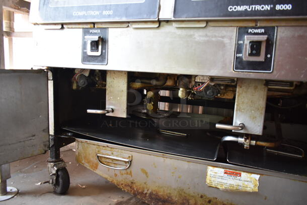 2016 Henny Penny OGA-323 ENERGY STAR Stainless Steel Commercial Natural Gas Powered 3 Bay Fryer w/ 4 Metal Fry Baskets on Commercial Casters. 255,000 BTU.  - Image 10 of 12